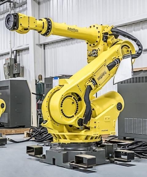 Robot industriel Fanuc en cellule